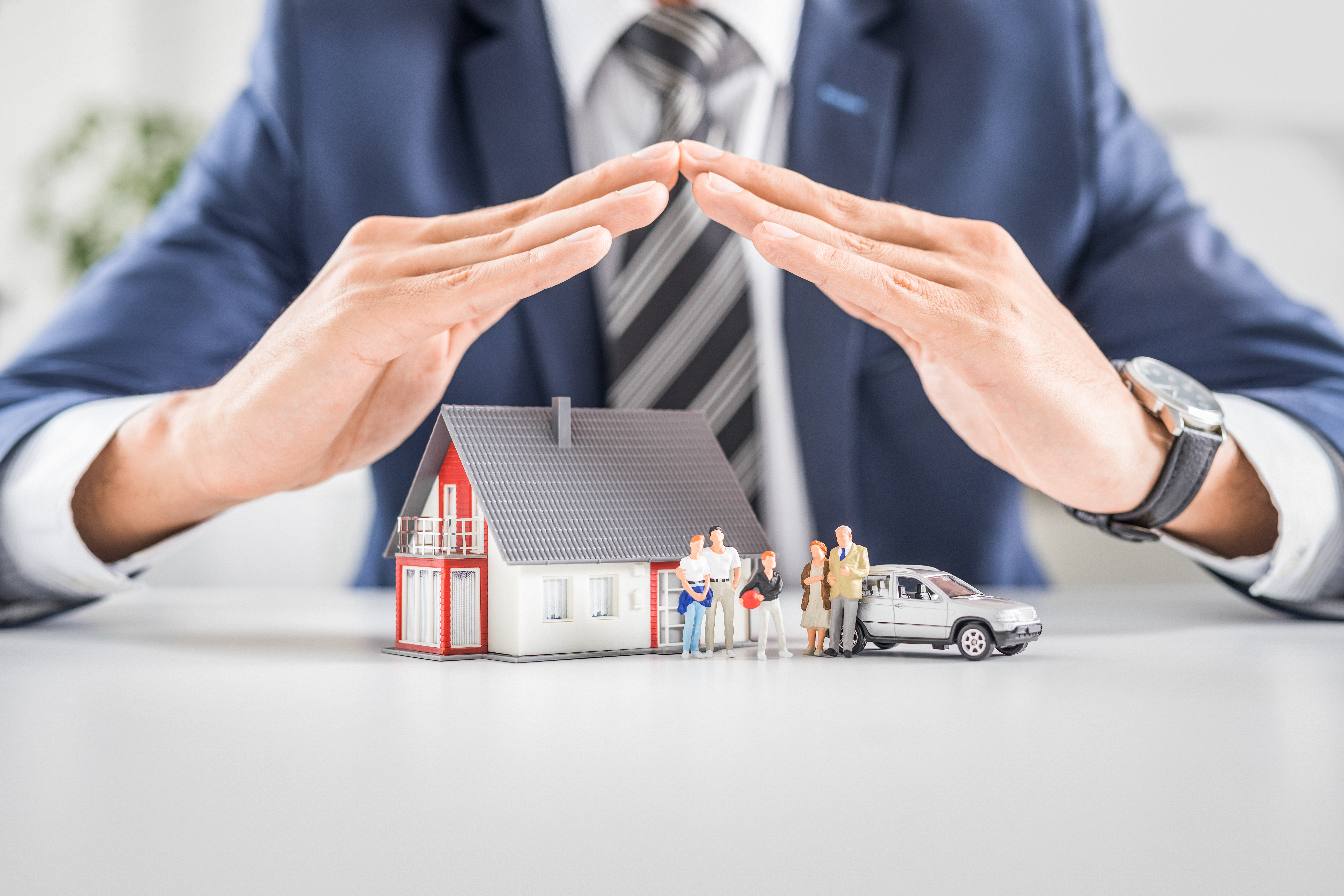 House  And Car Insurance Concept